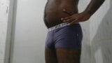 An Asian black boy pissing in his underwear snapshot 4