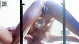 Riding transparent dildo on a glass table snapshot 6