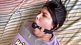 Ball Gagged Girl Struggle In Tape Bondage snapshot 1