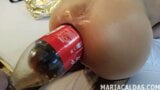 Maria Caldas 2L coca-cola bottle world record anal snapshot 9
