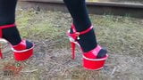 Lady L sexy walking with extreme red high heels. snapshot 1