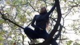 Girl masturbates on a tall tree in a public place - Lesbian-illusion snapshot 1