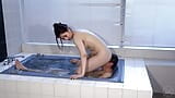 A man cunnilingus a woman in the bathroom and then she submerges him in the bathtub snapshot 8