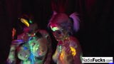 Black-light babes Nadia and Ophelia suck off a colorful cock snapshot 2