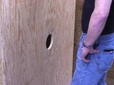 Guy gives BJ via glory hole snapshot 1