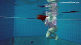 Redhead Simonna showing her body underwater snapshot 2