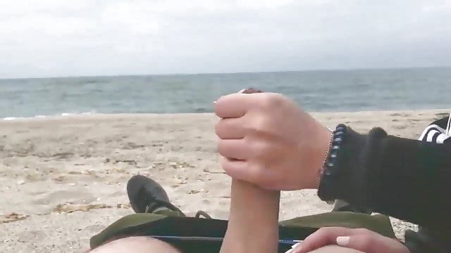 The delicious smell of young girls’ pussy is wafting through the public beach.