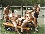 Naked babes all get fucked on a park bench snapshot 9