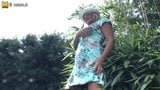 Amateur blonde STEPMOM playing in her garden snapshot 3