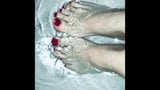 Mistress Andrea Parker's feet take a bath snapshot 1