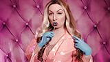 ASMR: blue nitrile gloves and candy sucking, wearing pink PVC coat, girl in braces  (Arya Grander) snapshot 5