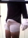 White bulging shorts and tight white gloves snapshot 2