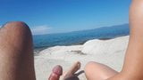 Handjob on a nude beach snapshot 1