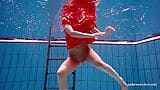 Cute babe in red sexy open dress swimming snapshot 12