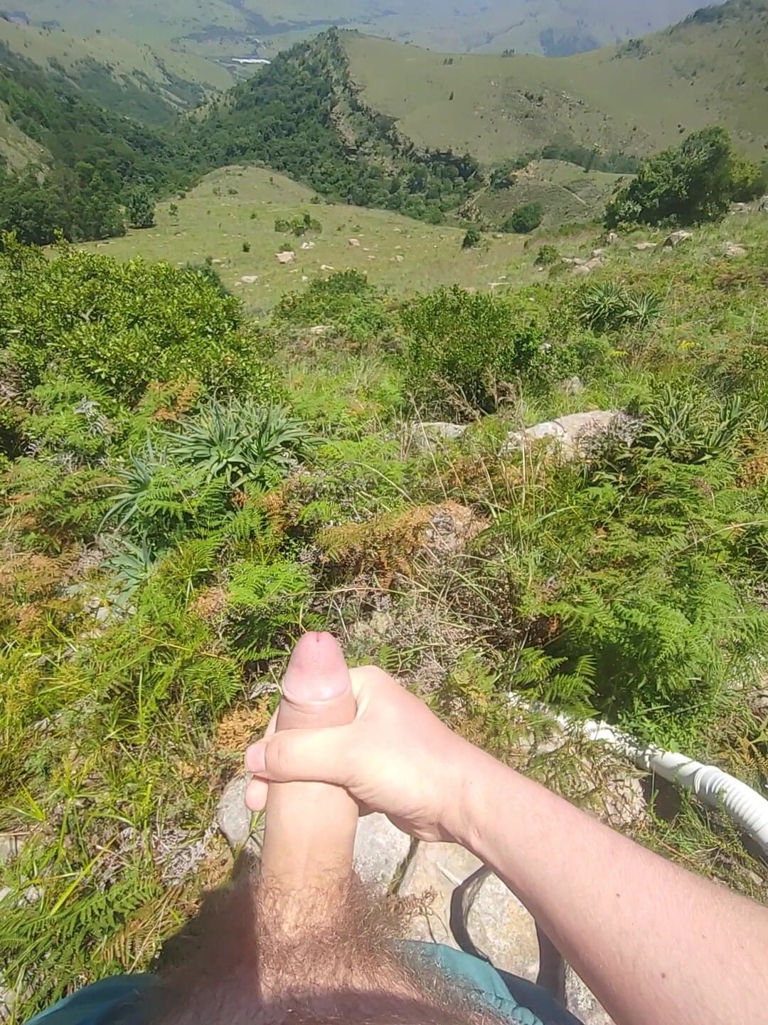 Jerking off in the mountains while hiking