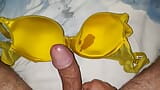 Pretty explosion of sperm on dirty yellow bra snapshot 1