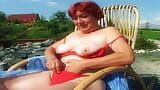 Younger dick is just what this redhead granny needed for relaxing outdoors snapshot 2