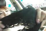 She is playing with her hairy pussy in car snapshot 15