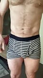 Task Borrow apprentices boxers and sport shorts and model them snapshot 2