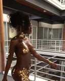 Hot African Girl Wearing Gold snapshot 1
