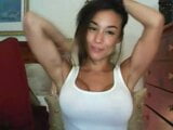 Webcam girl with big, tan lined tits flexing snapshot 1