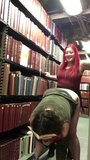 Lesbian strap-on at Library snapshot 4