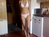 Sexy girl stripping to white bikini snapshot 7