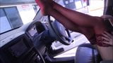 Young girl driving car in red stockings and heels snapshot 19