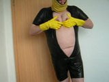 in my tight rubber short suit showing my fat man tits snapshot 10