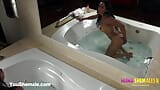 Big titty latina trans gets naked and into the bath to play in the water with her big round ass and fat long trans girl snapshot 4