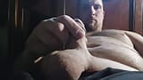 Good looking sexy man strokes cock is almost hard. snapshot 9