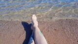 Dominatrix Nika enjoys the salty sea on her feet. snapshot 4