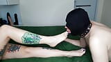 Foot fetish. Dominatrix Nika and her submissive foot slave. Massaging and licking feet, sucking toes snapshot 16