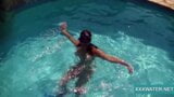 Sexy Candy swims and strips nude underwater snapshot 2