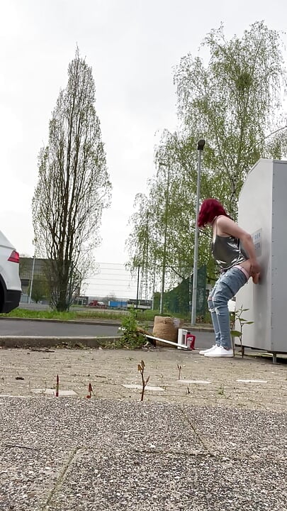 Fucking the dildo on the street