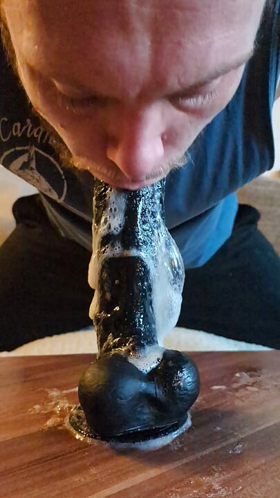 Very sloppy dildo deepthroat, a lot of saliva is running down the cock