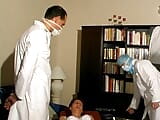 Three gynecologist examine one lusty chick snapshot 2