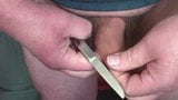 Foreskin with scissors and 3 dice snapshot 2