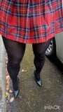 crossdresser in tartan skirt opaque tights and heels plays and cums in public snapshot 1