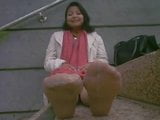 Asian woman showing her feet snapshot 3