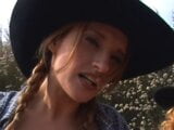 Cowgirls fucking outdoors with strap-ons snapshot 6