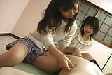 Two cute Japanese girl punishing guys cock snapshot 6