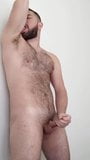 Sexy, hairy stud jerking-off snapshot 9