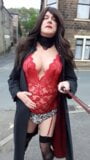 Crossdressed on the street outside a pub in sexy lingerie and stockings snapshot 2