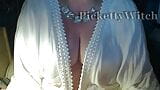 All in white. A bit of a tease as i play with my large boobs snapshot 1
