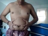 Cute Latino enjoys his new belly snapshot 7