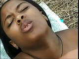 Two pretty ebony girlfriends are throating two dicks on the beach snapshot 12