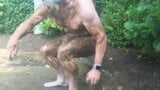 Naked gardening. Watering, muddy play and cold shower snapshot 12