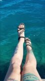 Dominatrix excites you with her feet on the sea snapshot 1