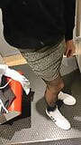 Black pantyhose in women's fitting room snapshot 4